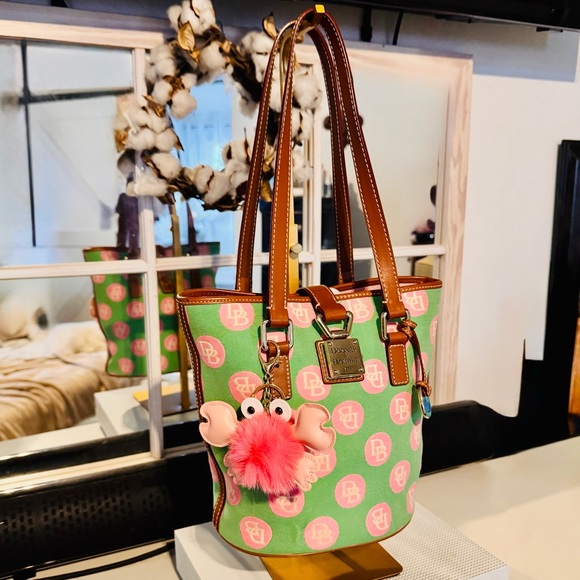 Dooney & Bourke Handbags - Dooney & Bourke Green & Pink Monogram bucket shoulder bag 11x9x5” EUC